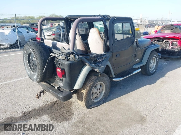 1997 Jeep Wrangler SE with VIN 1J4FY29P1VP449548, listed as a IAAI auction lot 41977699 with Not Provided miles and . Bid and sale history available at DreamBid. Image 4.