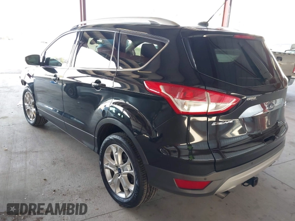 2015 Ford Escape Titanium with VIN 1FMCU0J98FUB95597, listed as a IAAI auction lot 41785188 with 84,141 mi miles. Bid and sale history available at carsss.com. Image 3.