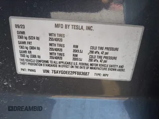 2023 Tesla Model Y Long Range with VIN 7SAYGDEE2PF883687, listed as a IAAI auction lot 41589837 with 36,890 mi miles. Bid and sale history available at carsss.com. Image 9.