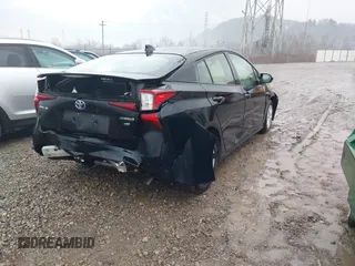 2021 Toyota Prius L Eco with VIN JTDKAMFU5M3145210, listed as a IAAI auction lot 41482234 with 85,600 mi miles and . Bid and sale history available at DreamBid. Image 4.