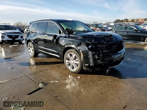 2023 Cadillac XT6 FWD Premium Luxury z VIN 1GYKPCRS6PZ127331, wystawiony jako Copart lot #88802755 z przebiegiem 47 796 mil mil oraz Szkoda całkowita • Salvage title. Historia ofert i sprzedaży dostępna na DreamBid. Obrazek 13.