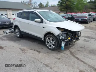 2016 Ford Escape Titanium with VIN 1FMCU9J98GUA00832, listed as a IAAI auction lot 42188941 with 90,764 mi miles and . Bid and sale history available at DreamBid. Image 1.