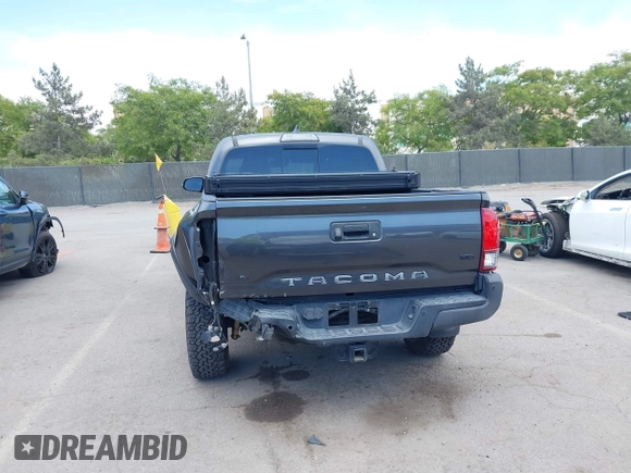 2019 Toyota Tacoma SR with VIN 3TMCZ5AN3KM207783, listed as a IAAI auction lot 42375280 with 55,784 mi miles and . Bid and sale history available at DreamBid. Image 17.