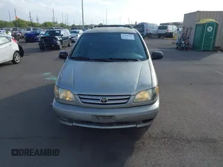 2002 Toyota Sienna LE with VIN 4T3ZF13C82U457803, listed as a IAAI auction lot 41198246 with 185,445 mi miles and . Bid and sale history available at DreamBid. Image 6.