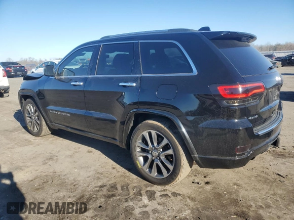 2017 Jeep Grand Cherokee Overland with VIN 1C4RJFCT7HC684746, listed as a Copart auction lot 83259314 with 106,848 mi miles and Salvage Title. Bid and sale history available at carsss.com. Image 2.