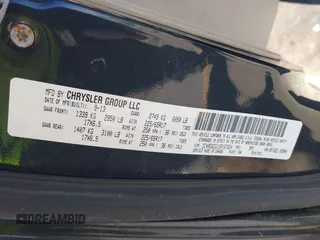 2014 Dodge Grand Caravan SXT with VIN 2C4RDGCG1ER167624, listed as a IAAI auction lot 41888822 with 202,729 mi miles and . Bid and sale history available at DreamBid. Image 9.