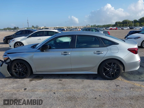 2025 Honda Civic Sport z VIN 2HGFE2F57SH519010, wystawiony jako IAAI lot #41934874 z przebiegiem 7999 mil mil oraz . Historia ofert i sprzedaży dostępna na DreamBid. Obrazek 14.