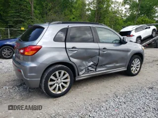 2011 Mitsubishi Outlander SE z VIN JA4AP4AU7BZ013457, wystawiony jako Copart lot #58860505 z przebiegiem 221 993 mil mil oraz Szkoda całkowita • Salvage title. Historia ofert i sprzedaży dostępna na DreamBid. Obrazek 3.