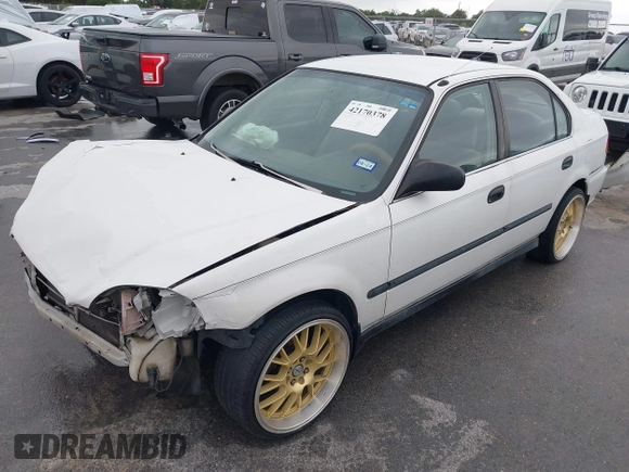 1997 Honda Civic LX z VIN 2HGEJ6676VH534795, wystawiony jako IAAI lot #42170378 z przebiegiem 228 033 mil mil oraz . Historia ofert i sprzedaży dostępna na DreamBid. Obrazek 18.