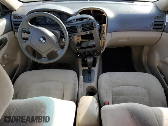 2005 Kia Spectra LX with VIN KNAFE122855108907, listed as a Copart auction lot 77502354 with Not Provided miles and Salvage Title. Bid and sale history available at carsss.com. Image 8.