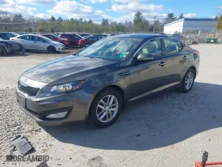 2012 Kia Optima LX with VIN 5XXGM4A72CG083861, listed as a IAAI auction lot 41909434 with 124,526 mi miles. Bid and sale history available at carsss.com. Image 2.