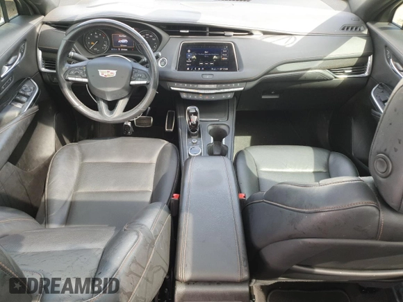 2022 Cadillac XT4 FWD Sport z VIN 1GYFZER47NF165920, wystawiony jako Copart lot #50389935 z przebiegiem 57 410 mil mil oraz Szkoda całkowita • Salvage title. Historia ofert i sprzedaży dostępna na DreamBid. Obrazek 8.