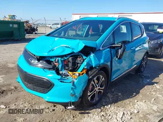 2020 Chevrolet Bolt EV Premier with VIN 1G1FZ6S0XL4121012, listed as a IAAI auction lot 41503991 with 56,957 mi miles and . Bid and sale history available at DreamBid. Image 2.