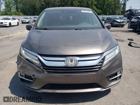 2019 Honda Odyssey Touring z VIN 5FNRL6H87KB098010, wystawiony jako Copart lot #54791505 z przebiegiem 94 477 mil mil oraz Szkoda całkowita • Salvage title. Historia ofert i sprzedaży dostępna na DreamBid. Obrazek 5.