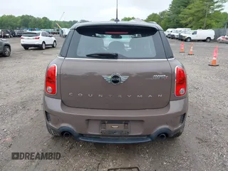2014 MINI Countryman S with VIN WMWZC5C55EWP41717, listed as a IAAI auction lot 42324347 with Not provided miles and . Bid and sale history available at DreamBid. Image 17.