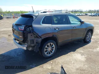2019 Jeep Cherokee Latitude Plus with VIN 1C4PJLLB7KD269814, listed as a IAAI auction lot 41956140 with 125,934 mi miles. Bid and sale history available at carsss.com. Image 4.