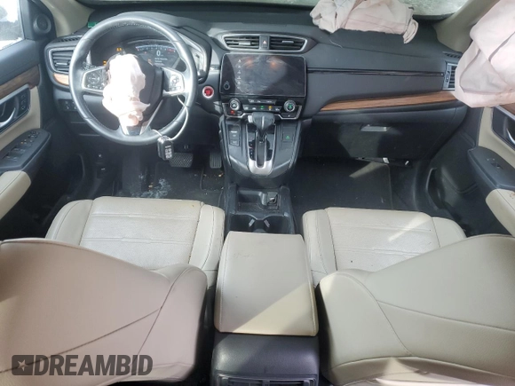 2017 Honda CR-V Touring with VIN 2HKRW2H91HH608340, listed as a Copart auction lot 43997625 with 58,446 mi miles and Salvage Title. Bid and sale history available at DreamBid. Image 8.