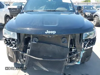 2021 Jeep Grand Cherokee Laredo E с VIN 1C4RJEAG1MC713555, выставлен на аукционе IAAI как лот 41973664 с пробегом 89 420 миль миль и . История ставок и продаж доступна на DreamBid. Изображение 19.