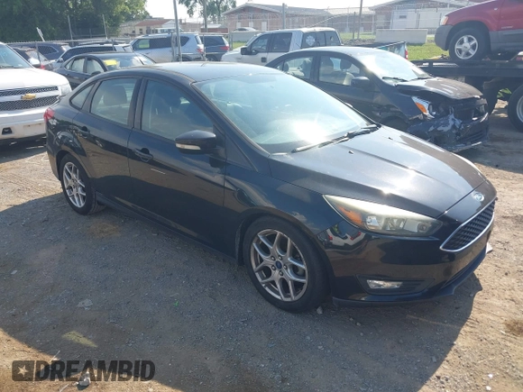 2015 Ford Focus SE z VIN 1FADP3F25FL284097, wystawiony jako IAAI lot #42553323 z przebiegiem 139 647 mil mil oraz . Historia ofert i sprzedaży dostępna na DreamBid. Obrazek 1.