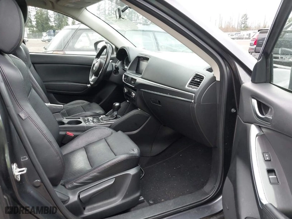 2016 Mazda CX-5 Grand Touring with VIN JM3KE4DY0G0652829, listed as a IAAI auction lot 41786042 with NaN miles. Bid and sale history available at carsss.com. Image 5.