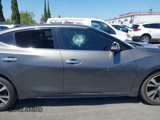 2018 Nissan Maxima Platinum z VIN 1N4AA6AP1JC388815, wystawiony jako IAAI lot #42098902 z przebiegiem 80 677 mil mil oraz . Historia ofert i sprzedaży dostępna na DreamBid. Obrazek 17.