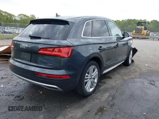 2019 Audi Q5 Premium Plus with VIN WA1BNAFY4K2038765, listed as a IAAI auction lot 42042264 with 58,557 mi miles. Bid and sale history available at carsss.com. Image 4.