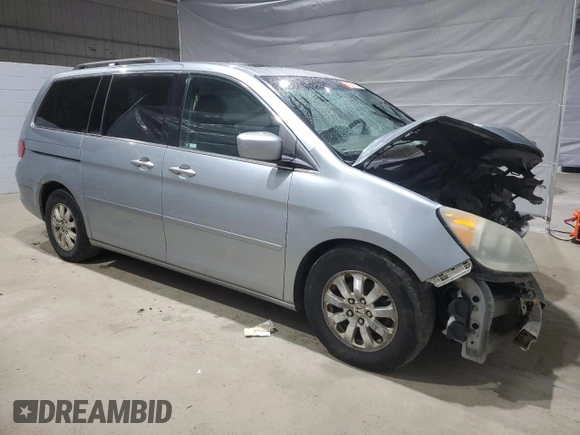 2008 Honda Odyssey EX-L with VIN 5FNRL38748B053878, listed as a Copart auction lot 49357005 with 222,876 mi miles and Salvage Title. Bid and sale history available at DreamBid. Image 4.