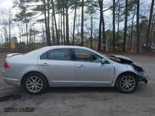 2012 Ford Fusion SEL with VIN 3FAHP0JA1CR234602, listed as a IAAI auction lot 41762107 with 84,834 mi miles. Bid and sale history available at carsss.com. Image 14.