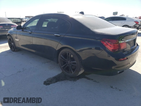 2015 BMW 7 Series 740Li xDrive with VIN WBAYF4C51FGS99088, listed as a Copart auction lot 47593145 with 133,825 mi miles and Salvage Title. Bid and sale history available at carsss.com. Image 2.