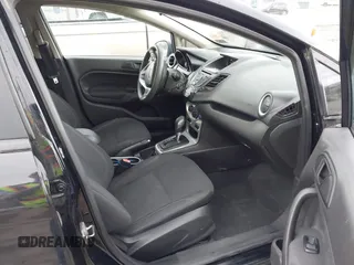 2018 Ford Fiesta SE with VIN 3FADP4BJ1JM134319, listed as a IAAI auction lot 41900382 with 113,555 mi miles and . Bid and sale history available at DreamBid. Image 5.