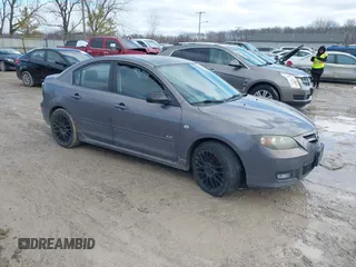 2007 Mazda 3 s Touring with VIN JM1BK323871709906, listed as a IAAI auction lot 41511390 with 192,945 mi miles. Bid and sale history available at carsss.com. Image 1.