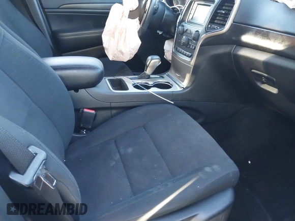 2017 Jeep Grand Cherokee Laredo with VIN 1C4RJFAGXHC756562, listed as a IAAI auction lot 40793476 with 102,241 mi miles and . Bid and sale history available at DreamBid. Image 5.
