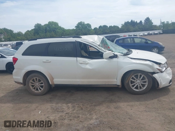 2017 Dodge Journey SXT z VIN 3C4PDCBG8HT534473, wystawiony jako IAAI lot #42351286 z przebiegiem 127 917 mil mil oraz . Historia ofert i sprzedaży dostępna na DreamBid. Obrazek 13.