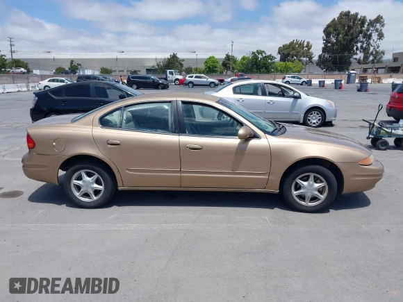 1999 Oldsmobile Alero GL z VIN 1G3NL52T1XC384073, wystawiony jako IAAI lot #42359330 z przebiegiem 177 869 mil mil oraz . Historia ofert i sprzedaży dostępna na DreamBid. Obrazek 13.
