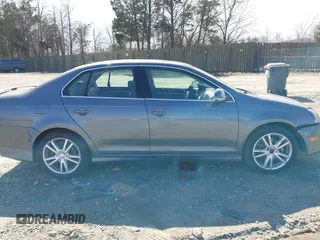 2006 Volkswagen Jetta Sedan 2.5L with VIN 3VWSG71K26M740777, listed as a IAAI auction lot 41743566 with 164,174 mi miles. Bid and sale history available at carsss.com. Image 13.