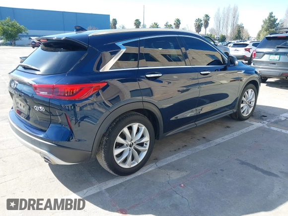 2019 Infiniti QX50 Essential with VIN 3PCAJ5M3XKF117723, listed as a IAAI auction lot 41549979 with 36,044 mi miles and . Bid and sale history available at DreamBid. Image 4.