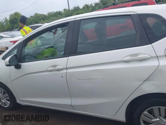 2015 Honda Fit LX with VIN 3HGGK5H52FM775462, listed as a IAAI auction lot 42549634 with 167,391 mi miles and . Bid and sale history available at DreamBid. Image 14.