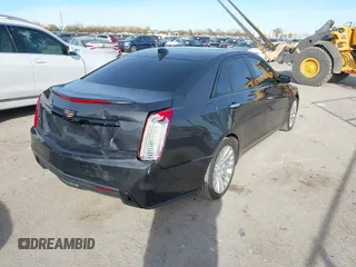2017 Cadillac CTS Sedan Luxury RWD with VIN 1G6AR5SX3H0127499, listed as a IAAI auction lot 41093864 with 77,464 mi miles. Bid and sale history available at carsss.com. Image 4.