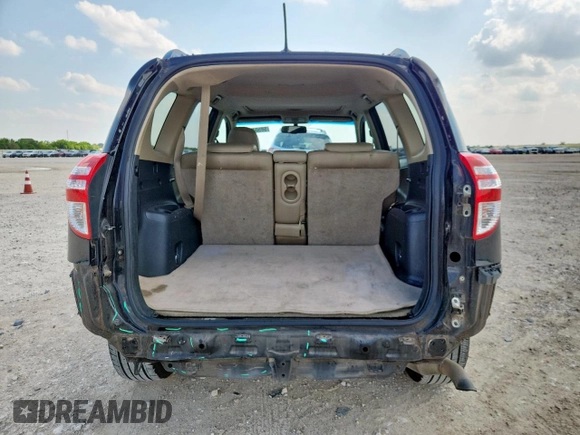 2010 Toyota RAV4 Limited with VIN JTMYF4DV6A5031711, listed as a Copart auction lot 58504215 with 171,428 mi miles and Salvage title. Bid and sale history available at DreamBid. Image 6.