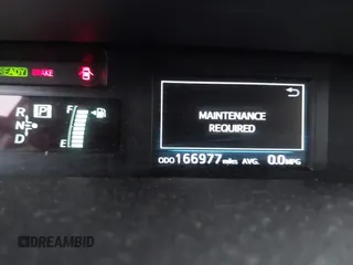 2015 Toyota Prius Two with VIN JTDZN3EU7FJ029780, listed as a IAAI auction lot 41837874 with 166,977 mi miles and . Bid and sale history available at DreamBid. Image 7.
