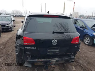 2012 Volkswagen Touareg Sport with VIN WVGFK9BP7CD002243, listed as a IAAI auction lot 41863765 with 136,231 mi miles and . Bid and sale history available at DreamBid. Image 16.
