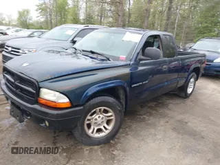 2002 Dodge Dakota Sport with VIN 1B7GL32X12S561414, listed as a IAAI auction lot 42060300 with 235,957 mi miles. Bid and sale history available at carsss.com. Image 17.