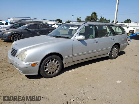 2001 Mercedes-Benz E-Class with VIN WDBJH65J01B276815, listed as a Copart auction lot 75748694 with 208,827 mi miles and Clean Title. Bid and sale history available at carsss.com. Image 1.