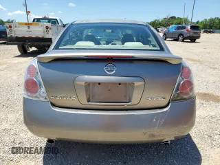 2005 Nissan Altima SE z VIN 1N4BL11D95N451242, wystawiony jako Copart lot #55942315 z przebiegiem 245 942 mil mil oraz Szkoda całkowita • Salvage title. Historia ofert i sprzedaży dostępna na DreamBid. Obrazek 6.