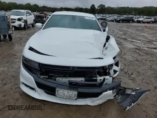 2019 Dodge Charger Police with VIN 2C3CDXAG3KH547577, listed as a Copart auction lot 79106194 with 81,077 mi miles and Salvage Title. Bid and sale history available at DreamBid. Image 5.