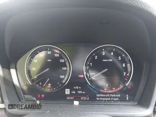 2022 BMW X1 xDrive28i z VIN WBXJG9C04N5V16794, wystawiony jako IAAI lot #41667535 z przebiegiem 55 747 mil mil oraz . Historia ofert i sprzedaży dostępna na DreamBid. Obrazek 7.