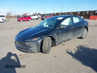 2025 Tesla Model 3 Long Range with VIN 5YJ3E1EB5SF877778, listed as a IAAI auction lot 41639595 with 8,295 mi miles and . Bid and sale history available at DreamBid. Image 16.