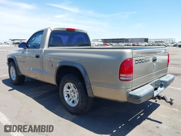 2002 Dodge Dakota with VIN 1B7FL16X72S642881, listed as a IAAI auction lot 42153560 with 220,917 mi miles and . Bid and sale history available at carsss.com. Image 3.