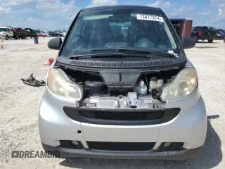 2009 Smart fortwo Pure z VIN WMEEJ31X69K280705, wystawiony jako Copart lot #73877374 z przebiegiem Nie podano mil oraz Nie do naprawy • Non repairable. Historia ofert i sprzedaży dostępna na DreamBid. Obrazek 5.