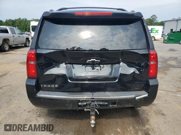 2016 Chevrolet Tahoe LTZ with VIN 1GNSCCKCXGR264655, listed as a Copart auction lot 57456625 with 237,621 mi miles and Salvage title. Bid and sale history available at DreamBid. Image 6.